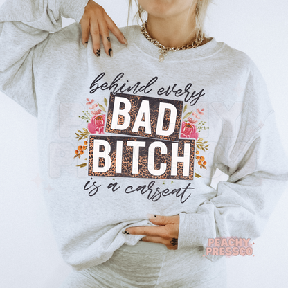 Behind Every Bad Bitch Is A Car Seat Apparel